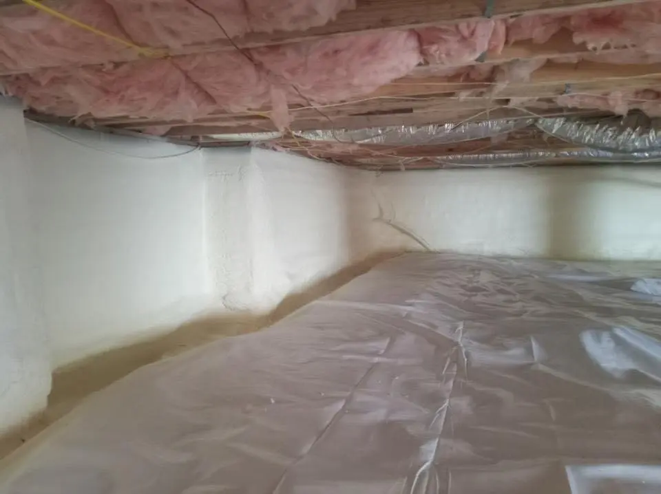 Crawl space encapsulation with closed-cell spray foam for Commercial Roof Restoration in Alpharetta